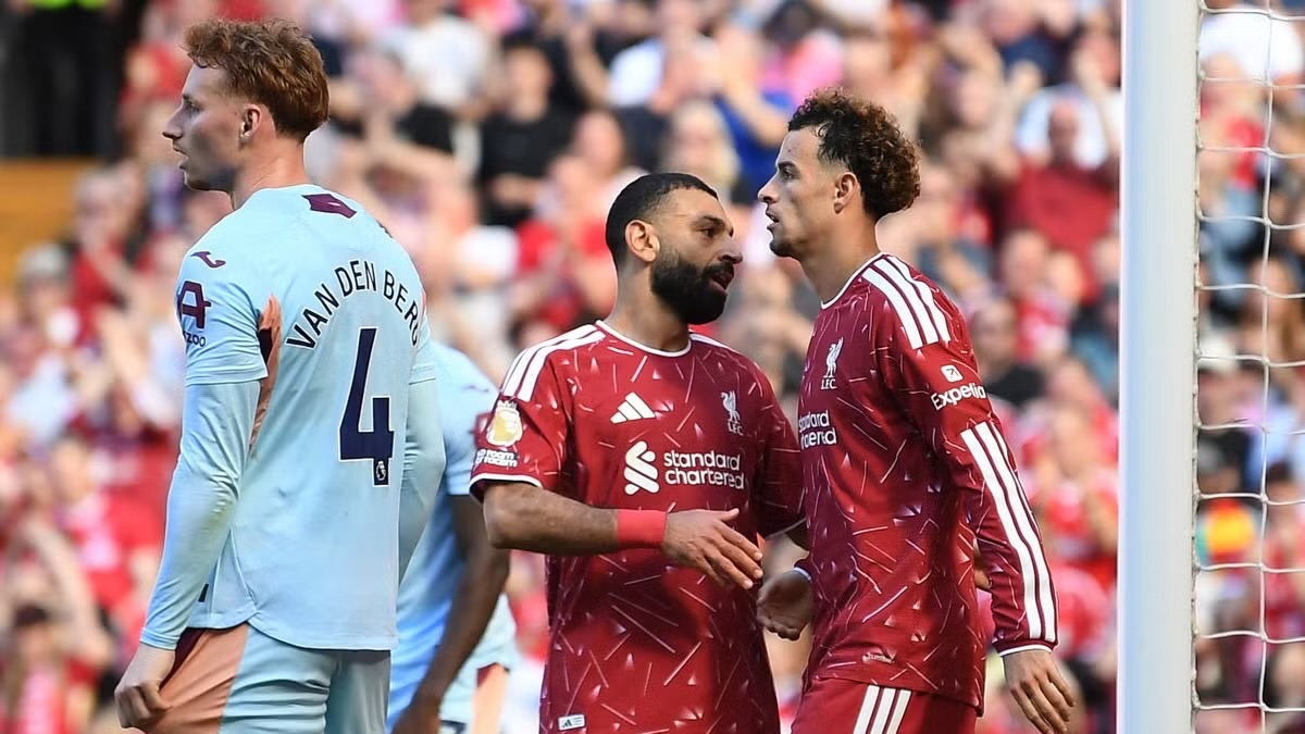 Liverpool's Curtis Jones celebrates scoring their first goal with Mohamed Salah